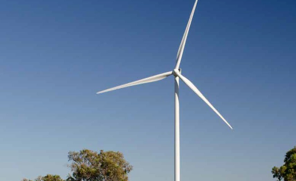 Wind turbine in the clear blue sky